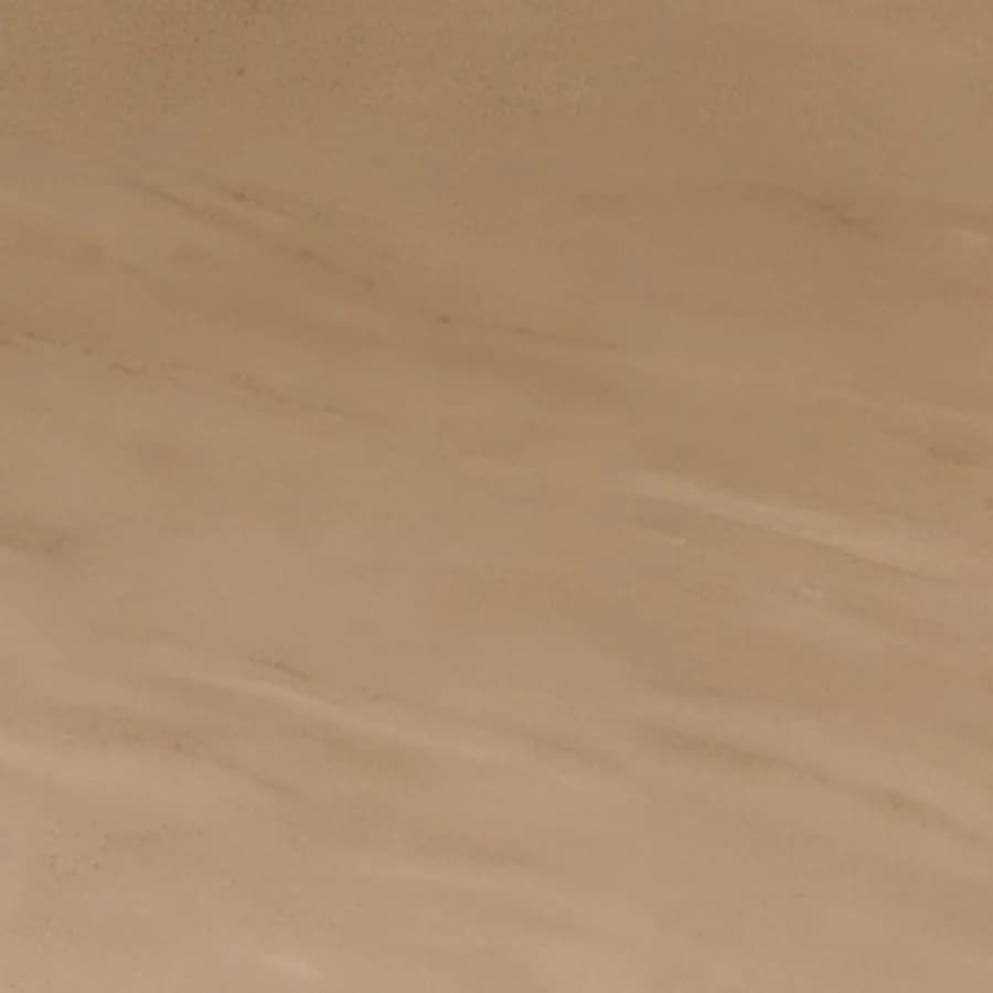Close-up of the smooth beige tile of the bathroom cladding
